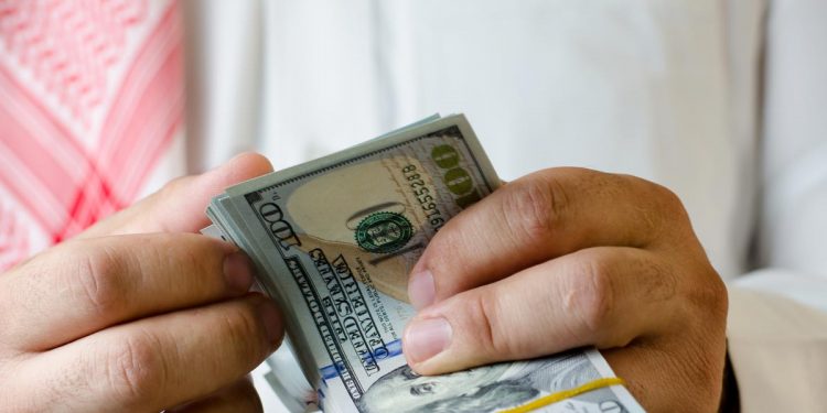 OECD, küresel ekonomide büyüme tahminini yükseltti